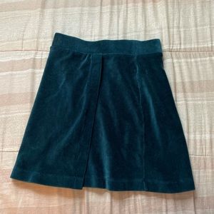 Green mini skirt